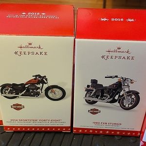 7 Hallmark collectable ornaments with boxes!5 HD motorcycles & 2 Hondas.